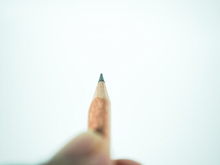 Sharp pencil tip ready for writing, sketching, and creative design on a clean white background
