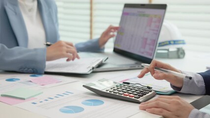 Expert woman asian female people review data number costing managerial account prepare monthly actual cost variance report income tax at audit office. ESG budget control ERP process service project.