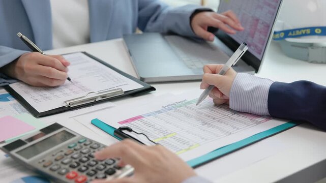 Expert woman asian female people review data number costing managerial account prepare monthly actual cost variance report income tax at audit office. ESG budget control ERP process service project.