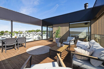 cozy luxury summer terrace with furniture and beautiful seascape
