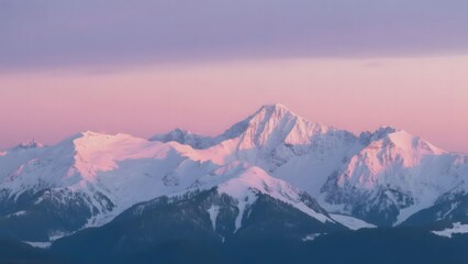 Snow-Capped Mountains at Sunset with Pink Sky