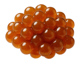 Cluster of shiny, orange-red salmon roe eggs arranged closely together on transparent background.