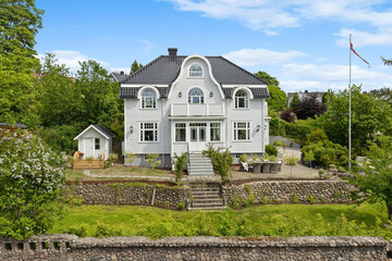 Modern luxury villa exterior in minimal scandinavian style, 3d render