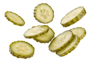 Sliced Pickles Floating on Black Background

