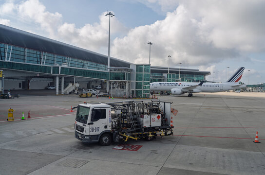 Porto City Airplane Ready at Airport with Ground Support Vehicles Nearby. Portugal