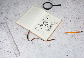 Back to School Notebook with Magnifying Glass and Ruler