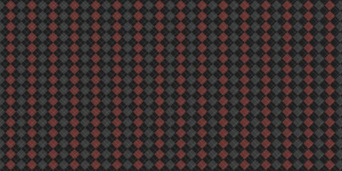 Seamless pattern with harlequin or diamond check motif in black and red with white dots on a gray background