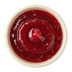 Close-up view of a round dish filled with vibrant red jelly, set against a plain background
