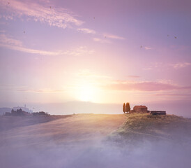 Soft morning light breaks through mist over rolling hills and a rustic hilltop farmhouse  minimal, peaceful, atmospheric