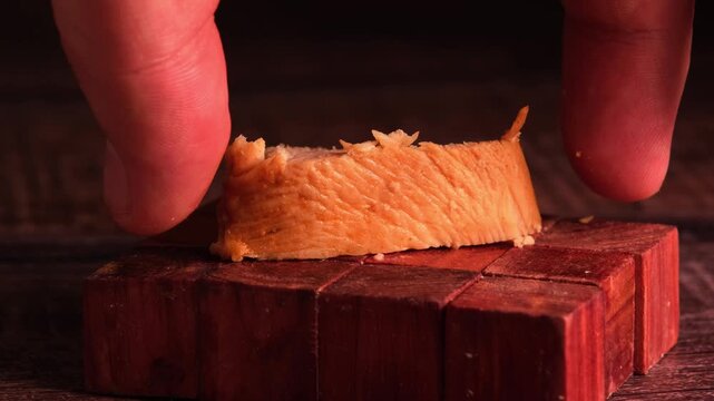 Piece of chicken cut into portions seasoned with soy sauce.