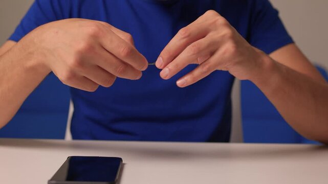 Detailed Process of Installing a SIM Card Utilizing Various Smartphone Components and Accessories