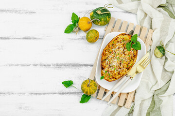 Baked spaghetti squash with spices, herbs and tomato sauce. Gluten free food, healthy dinner, vegan