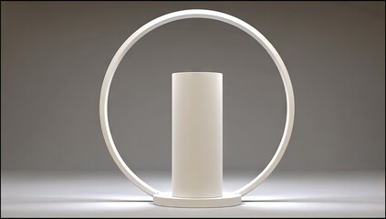 A simple, modern table lamp with a circular frame.
