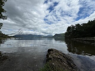 A dark and moody panoramic view of Derwent water in Cumbria, England, UK. 