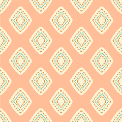 Hand drawn block print seamless pattern. Pastel peach pink and cream ajrakh print. Textured textile boho rhombic tiles.
