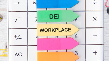 Business DEI diversity equity inclusion workplace concept. Copy space. Text DEI WORKPLACE written...