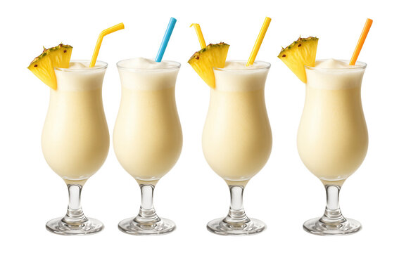 Four pina colada cocktails in curved glasses with pineapple garnishes and colorful straws on transparent background.