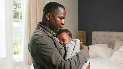 Loving Father Holding His Sleeping Child in a Bright, Peaceful Bedroom Setting