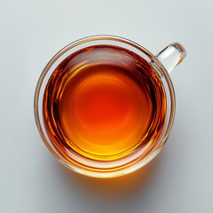 Glass cup of black tea on white background, top view