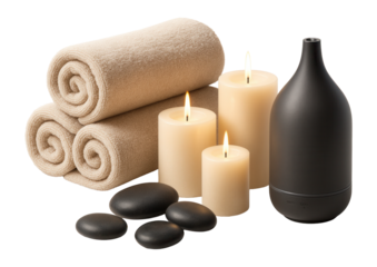 Spa setup with rolled towels, lit candles, smooth black stones, and a diffuser, creating a relaxing atmosphere on transparent background.