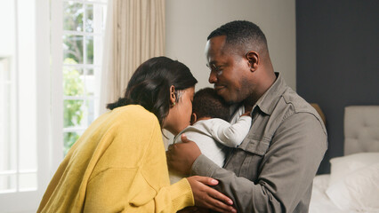Loving Family Embracing Together in a Cozy Home Setting Showing Bonds of Love and Care