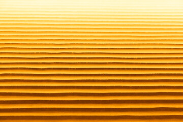Textura de una pared con ondas tipo dunas con colores cálidos