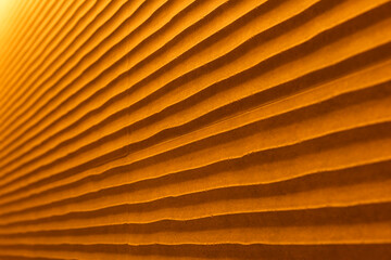 Textura de una pared con ondas tipo dunas con colores cálidos