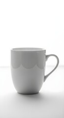 Fototapeta premium A Simple White Ceramic Coffee Mug With A Handle