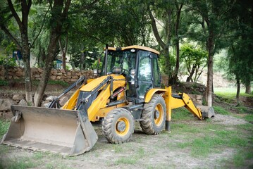 backhoe loader at work site
