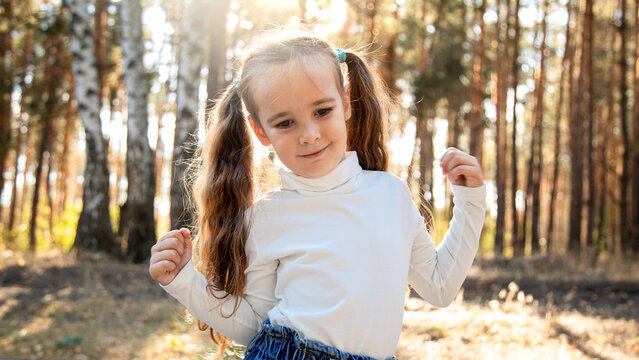 Portrait child, girl a 4 year old walking in park - Powered by Adobe
