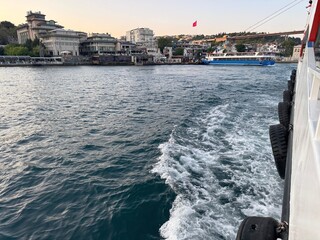 View of the Bosphorus from a ferry deck with tires on board in Istanbul, Turkey