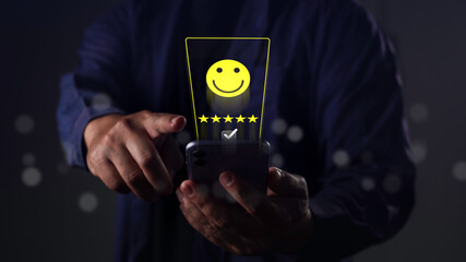 Customer giving five-star rating via smartphone, showing satisfaction, review feedback, and positive user experience in digital service interaction.