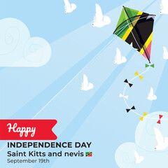 Fototapeta premium Kite with Saint Kitts and Nevis Flag Flying Under Bright Blue Sky with Sunlight and White Doves. Saint Kitts and Nevis Independence Day.