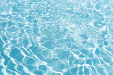Blue water with ripples on the surface. Defocus blurred transparent blue colored clear calm water...