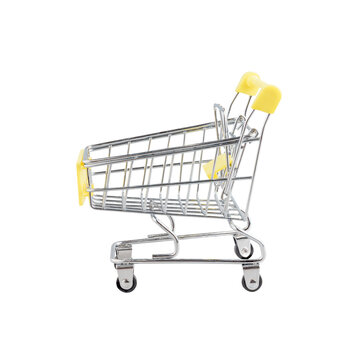 Yellow cart toy is like a shopping cart in a supermarket. Symbols buy, sell, shopping or material for creativity ideas. Isolated, Isolated on white background in full depth of field with transparent.