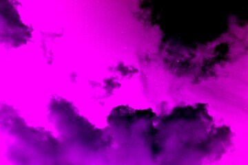 Obraz premium A vibrant and colorful abstract sky with fantasy clouds. A dreamy, surreal background texture for creative design projects.