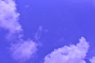 A vibrant and colorful abstract sky with fantasy clouds. A dreamy, surreal background texture for creative design projects.