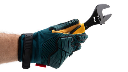 Hand holding adjustable wrench in work glove