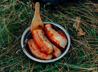 grilled sausages on a grill