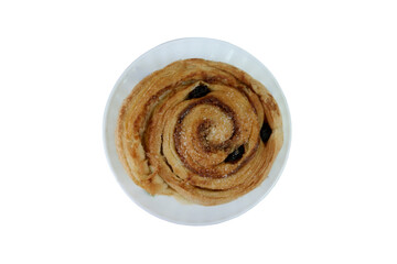 Freshly Baked Danish Pastry with Raisins and Sugar Topping On a White Plate