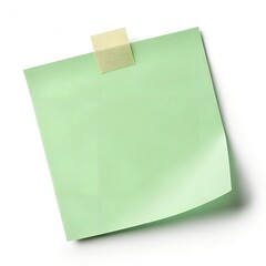 Light green sticky note with tape isolated on white background