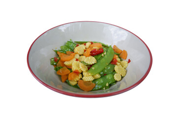Stir-fried green beans with baby corn, carrots, chili peppers vegetarian dish.