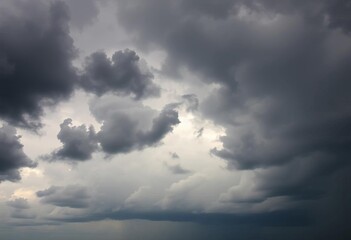 Heavy, dark clouds dominate a stormy sky, rain imminent,  nimbus, stormy