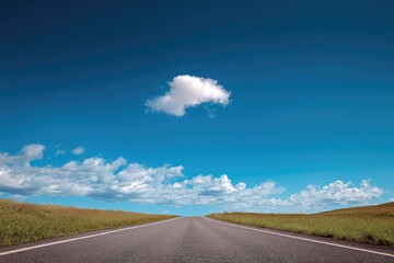 Fototapeta premium Empty highway under a vibrant blue sky (1)