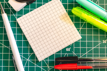 School supplies on a green background. Back To School background