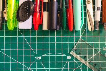 School supplies on a green background. Back To School background