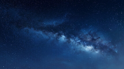 Fototapeta premium Stunning night sky with vibrant Milky Way galaxy over a serene landscape featuring countless twinkling stars and cosmic dust clouds