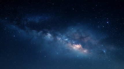 Obraz premium Stunning night sky with vibrant Milky Way galaxy over a serene landscape featuring countless twinkling stars and cosmic dust clouds