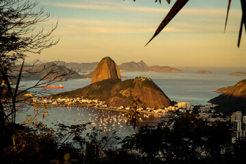 Rio de Janeiro, RJ, Brazil, 08/03/2025 - Sugar Loaf and Urca hills and Botafogo cove at sunset, seen from the Dona Marta viewpoint