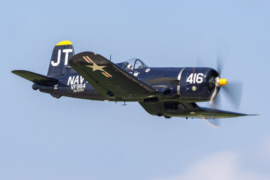 F4U Corsair in Level Flight with Glossy Navy Livery and Folded Wings